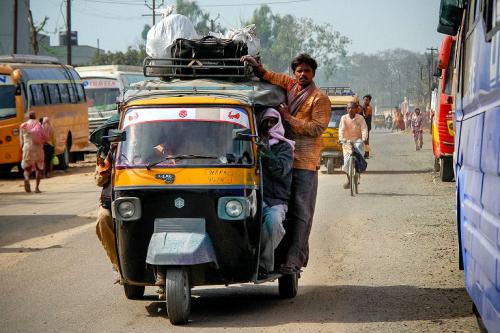 Rickshaws gehören ins Straßenbild von indischen Städten.